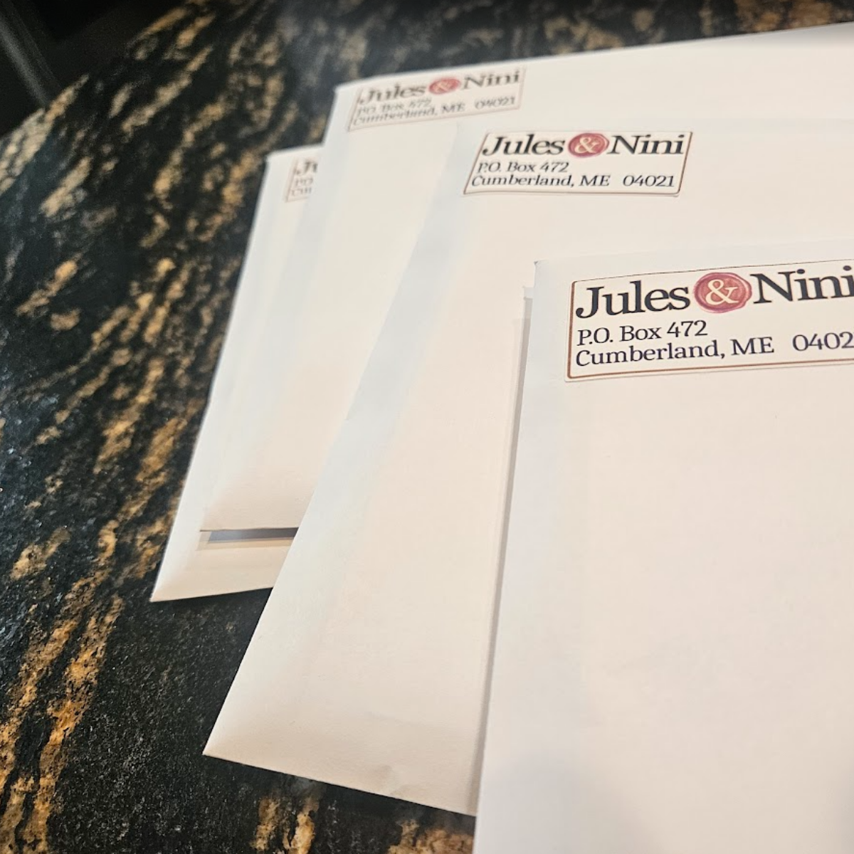 Two Jules & Nini envelopes hand-addressed from Cumberland, Maine